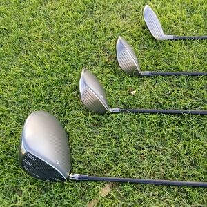 Set of Golf Clubs with Black and Silver Heads